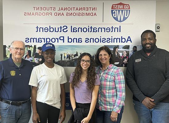 L to R: Misheck Malangano, 澳门新普京注册; Lynn Clarke, Rotary; Ana Paula Ruiz Burkart, 澳门新普京注册 scholarship recipient; Favour Onwanuo, 澳门新普京注册 scholarship recipient; George Siggins, Rotary